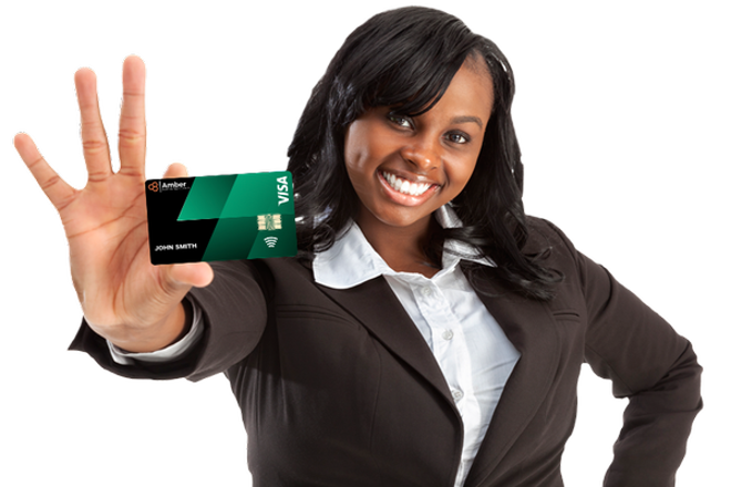 A young black lady in a suit holding up a My Amber Card whilst smiling